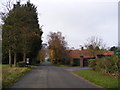 Cranley Green Road & entrance to Cranley Manor