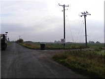 TM1772 : Cranley Green Road & entrance to Kings Farm by Geographer