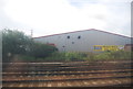 Modern warehouse by the railway line