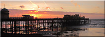 TQ8108 : Sunrise over Hastings Pier by Oast House Archive