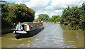 Narrowboat cruising north of Middlewich, Cheshire