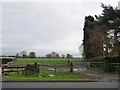 Muddy field entrance off Crown Lane