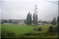 Pylon by the railway line in heavy rain