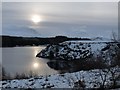 NN3781 : Winter sun over Laggan water by Alan Reid