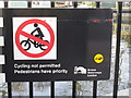 TQ2681 : Paddington Arm - contradictory "Cycling not permitted" sign by David Hawgood