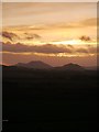 NT6745 : December Sunset From Rumbletonlaw by James T M Towill