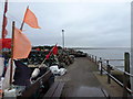 SZ1891 : Mudeford: flags aflutter on the quayside by Chris Downer