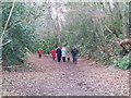 Walkers on the old railway track heading from Bovey Tracey to Moretonhampstead