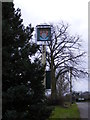 Stratton Road & The Chequers Public House sign