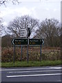 TG2119 : Roadsigns on the A140 Cromer Road by Geographer