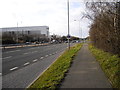 The East Lancs Road, at the junction with the A5208