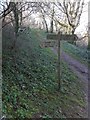 Footpath sign in Tor Woods above Overbeck