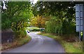 Rectory Road approaching the junction with the A41 road, near Donington