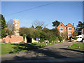 Cottages and All Saints church, Easton