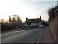 Pink car leaving Selborne on the B3006