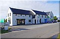 M1306 : Retail premises on the R477 road near Fanore, Co. Clare by P L Chadwick
