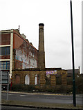 SE1732 : Old mill chimney on Leeds Road by Stephen Craven