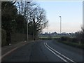 Chester Road (A56) curving alongside the Bridgewater Canal