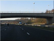SJ4290 : M62 motorway - junction 5 bridges by Peter Whatley