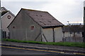 Electricity substation at a bend in Verne Common Road