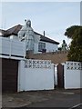 Statues in a garden in Mill Lane