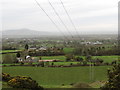 Power lines descending into the valley