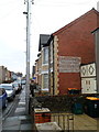 Writing on a wall of a Duckpool Road house, Newport