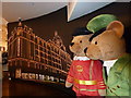 Harrods- beefeater and doorman by an illuminated display