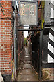 The entrance to the court yard In which the Penny Farthing Museum can be found