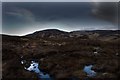 NR3469 : The snow begins to clear, Loch na Leoig, Islay by Becky Williamson