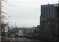 Dropping down to Archway roundabout, with a view of the City beyond