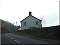 House on the road through Calverleigh and woodland