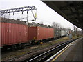 TQ2182 : Freight train passing Willesden Junction by Christopher Hilton