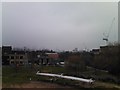 A misty view of Bow from the mound in Mile End Park