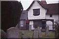 Clare: houses by the churchyard