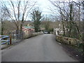 Old stone bridge over the Afon Alun / River Alyn near Bradley Mill Farm