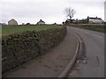 Cut benchmark on a wall opposite the allotments