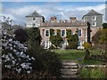 South front of Ince Castle with magnolia in flower