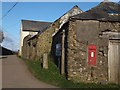 SX4058 : Farm buildings at the crossroads at Longlands by David Smith