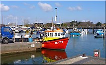 SZ3295 : Fishing Boat at Lymington Quay by Mike Smith