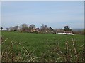 Rull Farm and Little Rull seen across field