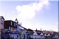 Southwold: beach huts below the Promenade