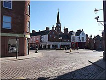 NO3853 : Cobbled square and kirk in the centre of Kirriemuir by Oliver Dixon