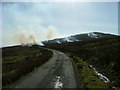 NG4066 : Muirburn on the slopes of Reieval by Dave Fergusson