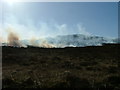 NG4065 : Muirburn on the slopes of Reieval by Dave Fergusson