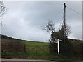 Black Lake Cross and field on the hillside