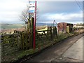 SE0320 : Bus stop at the end of a footpath, Lane Head Road, Soyland by Humphrey Bolton