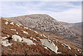 NR8944 : Heather slope with granite boulders on Meall Donn by Trevor Littlewood