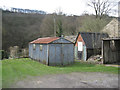 Garage, outbuildings and valley side