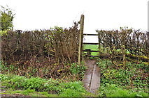 SK0534 : Stile and Footpath in Pigeonhay Lane by Mick Malpass